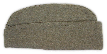 Left side of the enlisted man's garrison cap.  The olive‐drab wool fabric used in construction had a raised nap.  Just like its American counterpart, the cap had curved peaks, a turned‐up curtain that crossed in the front, and a center gusset.