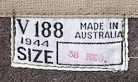 Close‐up view of manufacturer's label located inside of the wool jacket.  This particular jacket was made in the state of Victoria in 1944.  Reverse Lend Lease garments displayed U.S. size markings.