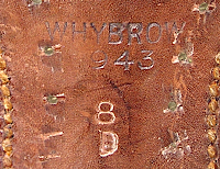 Label located on the shank of the Australian made hobnail service shoes shown to the right and below.  The manufacturer is Whybrow, the contract year 1943, and the size is 8D. Whybrow was a large shoe manufacturer located in Melbourne in the state of Victoria.