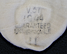 Ink stamped label on the toe of Australian made light wool socks shown above.  The label shows the manufacturer code is V37, year 1944, Guaranteed Unshrinkable, and size 11.