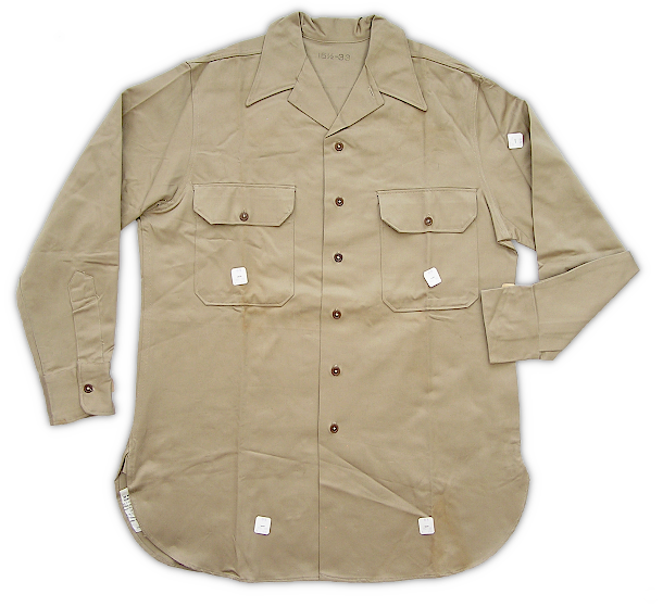 Convertible collar khaki cotton shirt (specification PQD 96A, 8 October 1941).  Developed for use in the tropics and approved 26 September 1941, this shirt featured a collar that could be worn open sports style without a necktie or buttoned with a necktie.  Improvements in the functionality of the collar led to the shirt being approved as standard issue for all troops on 27 November 1941.  The convertible collar desgin gradually replaced the specification QMC 6‐241 shirt approved in 1938.  Successful implementation of the convertible collar involved eliminating the standing part of the collar, increasing the spacing between the collar button and second button, and removing the front button placket.