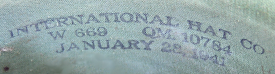 Contractor label printed on the inside of the fiber helmet shown to the left.  This helmet was manufactured by the International Hat Co. of St. Louis, Missouri.  Contract 10784 was issued on 28 January 1941 for $51,000.00 and was completed in June 1941.  International Hat and Hawley Products of St. Charles, Illinois were the principal manufacturers of tropical helmets for the US military during WW2.