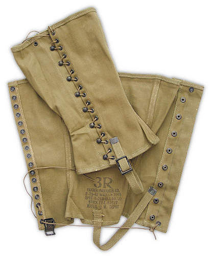 Khaki dismounted M‐1938 canvas leggings (specification QMC 6‐288, 8 August 1940).  Leggings were universally adopted by the Army when trousers replaced breeches in 1938.  They were worn when campaigning or during field training exercises to protect the lower leg and keep debris out of the shoes and trousers. Height was 12 ¾‐inches and the fabric was heavy No. 6 canvas duck.  Leggings were laced over the service shoes using a series of hooks and eyelets with the lower end being secured with a web strap that buckled around the shoe shank.  Trousers were tucked in at the top. Olive‐drab shade canvas gradually replaced khaki beginning in 1941.