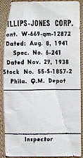 Contractor's label for the khaki cotton shirt shown above.  Labels were located on the inside of the right, rear shirt tail.  Phillips‐Jones Corp. of Barnesboro, PA. was a primary shirt contractor for the Army throughout WW2.  Contract 12872 was issued in August 1941 for $252,000 and completed in February 1942.