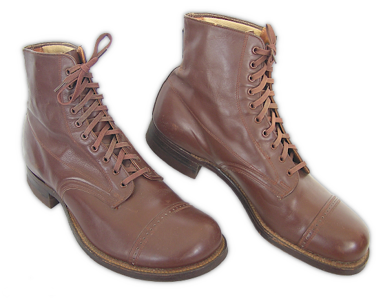 Garrison Shoes (specification QMC 9‐35A, 1933). Though similar looking to standard high‐top service shoes, garrison shoes were lined with cotton and built for comfort instead of marching.  They were made with calfskin uppers making them much softer and easier to break in.  The tan low‐quarter shoe, a restricted issue shoe for much of the war, began to replace this shoe in 1941.