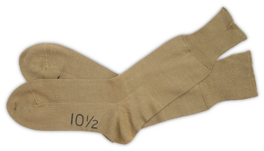 Tan cotton socks (federal specification JJ‐S‐566A, 26 August 1938). These socks were authorized for wear with the khaki cotton uniform.  Though worn with standard service shoes, garrison shoes, and low quarter shoes, tan cotton socks were primarily a dress item and therefore not appropriate for marching or field use.  Light wool socks in white or olive‐drab shade were also worn with the khaki uniform.