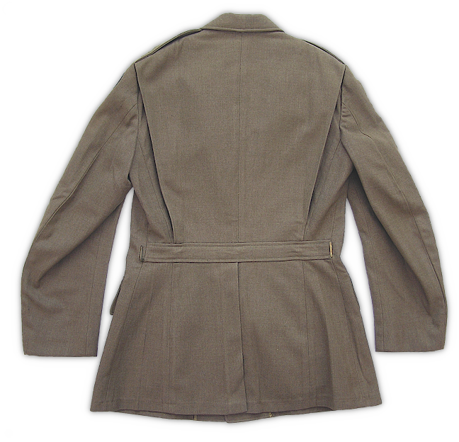 Rear view of the enlisted man's wool service coat. Visible are the shoulder pleats, cloth half belt, hooks to support the leather belt, and rear skirt vent. In March 1941, the belt hooks were discontinued after the leather belt was withdrawn as a standard issue item. However, the leather belt remained a popular item for wear on leave and could be purchased commercially throughout the war years. Because of this situation, belt hooks were often permanently removed from older coats or added to newer ones depending on whether the soldier desired to wear the belt.