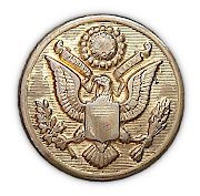 Close‐up view of one of the gilt buttons used on the service coat shown below. The coat had a total of 10 buttons: four 36‐ligne (9/10‐inch) for the front opening, one 25‐ligne (⅝‐inch) for each of the four pockets, and one 25‐ligne for each of the two shoulder loops. Army regulations called for buttons to be gold colored metal, with a raised rim, and the Coat of Arms of the United States to be displayed in clear relief against a horizontally lined background. Damage in the form of bent stems and crushed domes often occurred to these buttons when the coat was pressed during dry cleaning operations.