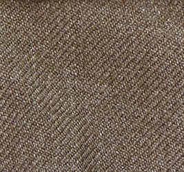 Close‐up view of the 18‐ounce serge wool fabric in olive‐drab shade 33 used in the construction of the enlisted man's wool service coat, service cap, and field cap. The same fabric was used in the construction of the enlisted man's wool trousers except in olive‐drab shade 32 "light shade". Note the diagonal lines evident in the weave. The term serge refers to this ribbed pattern and was used to enhance the garment's durability.
