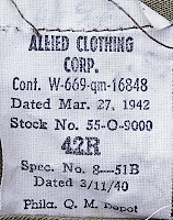 Contractor's label for the olive‐drab melton wool overcoat shown above. Allied Clothing Corp. was located in Linden New Jersey and manufactured overcoats for the Army throughout much of the war. Contract 16848 was awarded on 27 March 1942 for $367,000. The contract was completed in December 1942.
