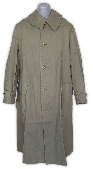 Enlisted men's dismounted M‐1938 rubberized raincoat (specification QMC 20‐104, 7 January 1939). The M‐1938 raincoat was a fairly elaborate design featuring a standing and rolling collar with throat latch, outside bellows pockets with slanted flaps, back vent, interior storm flap, and tightening straps on each sleeve. Pre‐war raincoats were made of rubberized fabric and superseded the oil treated type that dated back to the World War 1 era. In early 1942, a simplified raincoat made with synthetic resin coated fabric began replacing the rubberized type.