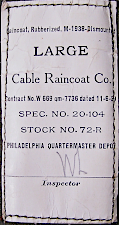 Contractor's label for the dismounted M‐1938 rubberized raincoat shown above. Contract 7736 was awarded to the Cable Raincoat Co. of Stoughton Massachusetts on 6 November 1939. Cable Raincoat was a primary contractor for US Army wet weather clothing during the World War 2 era.