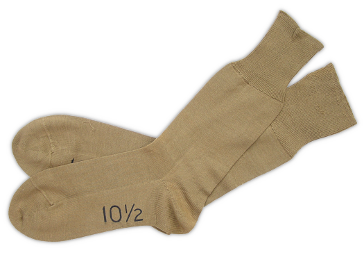Tan cotton socks (federal specification JJ‐S‐566A, 26 August 1938). These socks were authorized for wear with both the cotton and wool uniforms and with a variety of shoes including standard service shoes, garrison shoes, and low quarter shoes. Tan cotton socks were primarily a dress item and therefore were not appropriate for marching and field wear.
