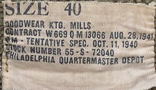 Contractor's label for the sleeveless sweater shown above. Contract 13066 was awarded to Goodwear Knitting Mills of Philadelphia, PA. on 28 August 1941. Goodwear Knitting made knitwear for both the Army and Navy throughout the World War 2 years. The revised sleeveless sweater was introduced in October 1940 along with a novel field jacket and the revised field cap shown above.
